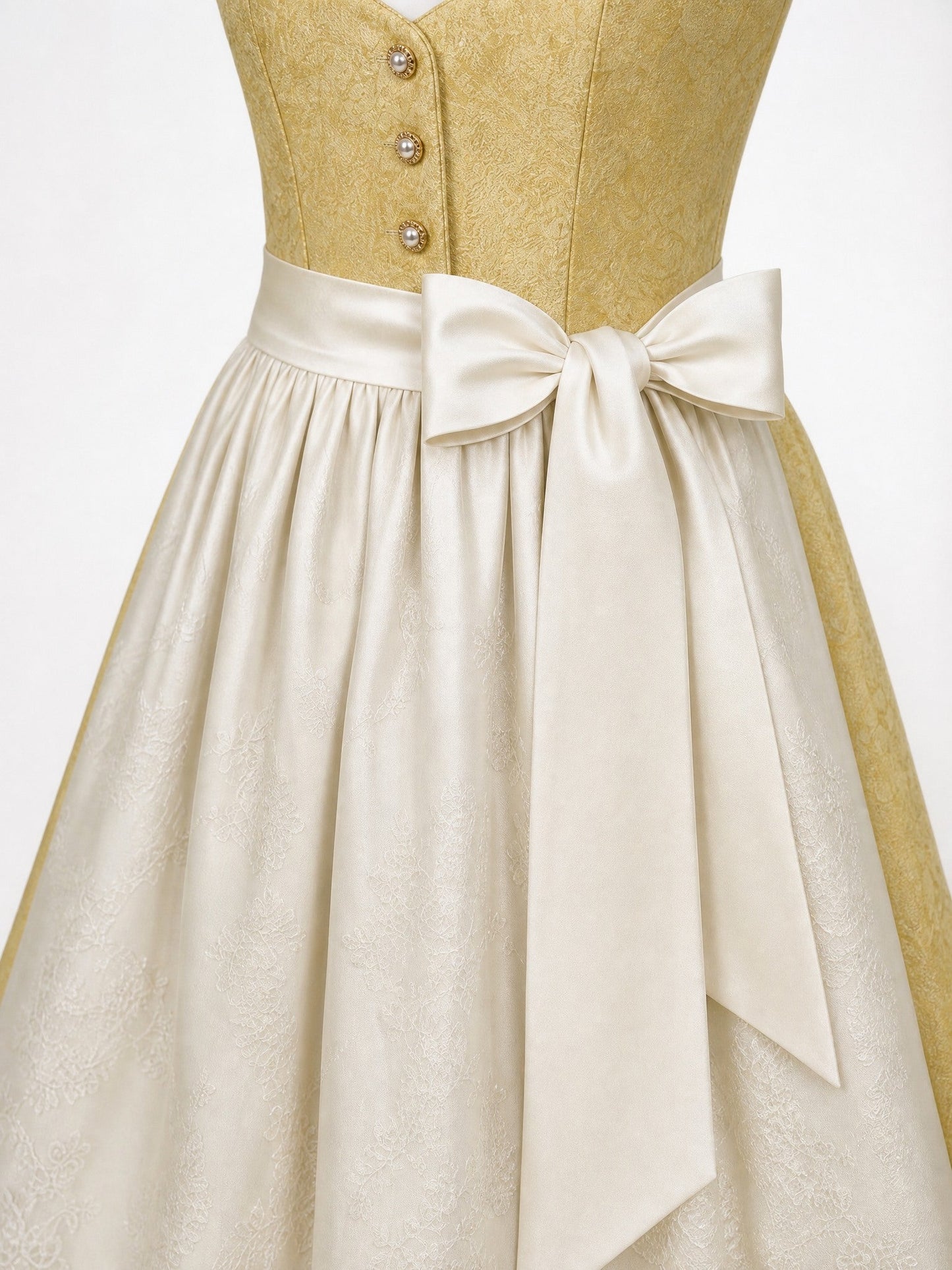 Dirndl Daria in Weizengold mit Elfenbein Schürze - Detailansicht Taille und Schleife