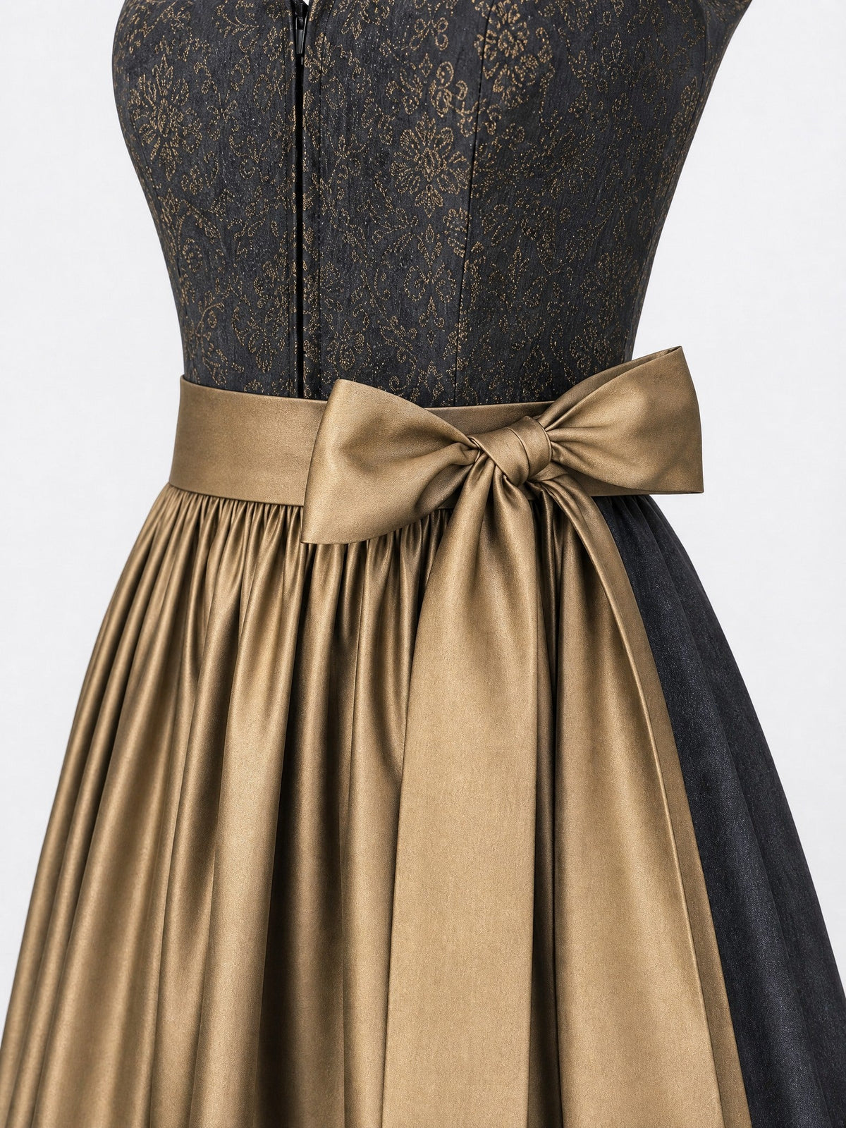 Dirndl Greta in Anthrazit mit Antikgold Schürze - Detailansicht Taille und Schleife