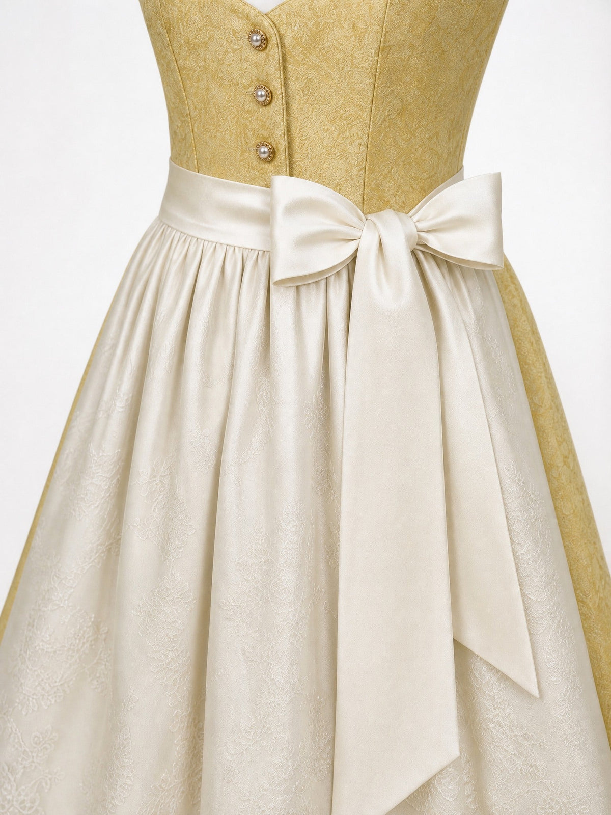 Dirndl Daria in Weizengold mit Elfenbein Schürze - Detailansicht Taille und Schleife